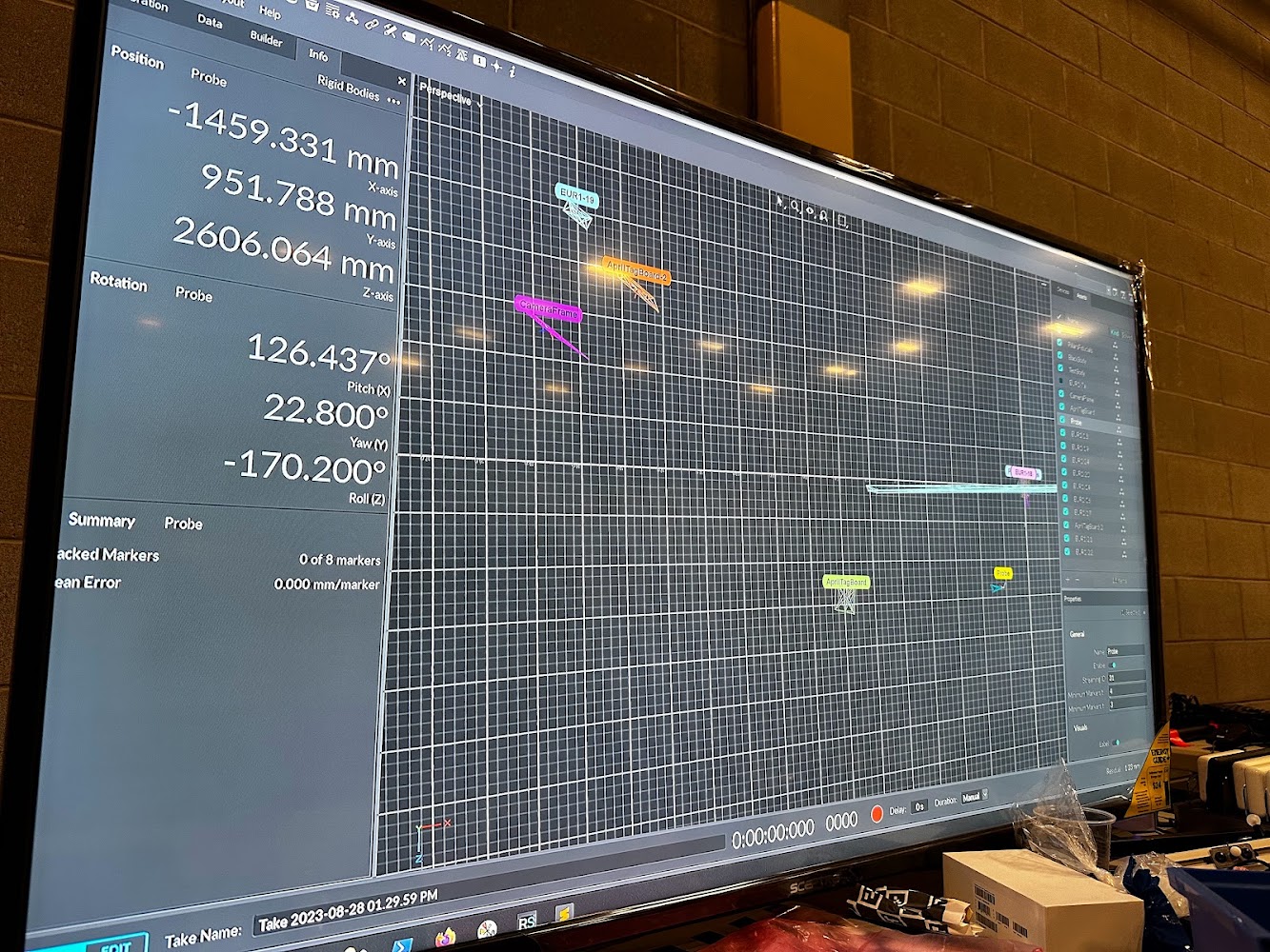 OptiTrak motion capture software showing live 6-DoF probe position, rotation, and tracked rigid bodies